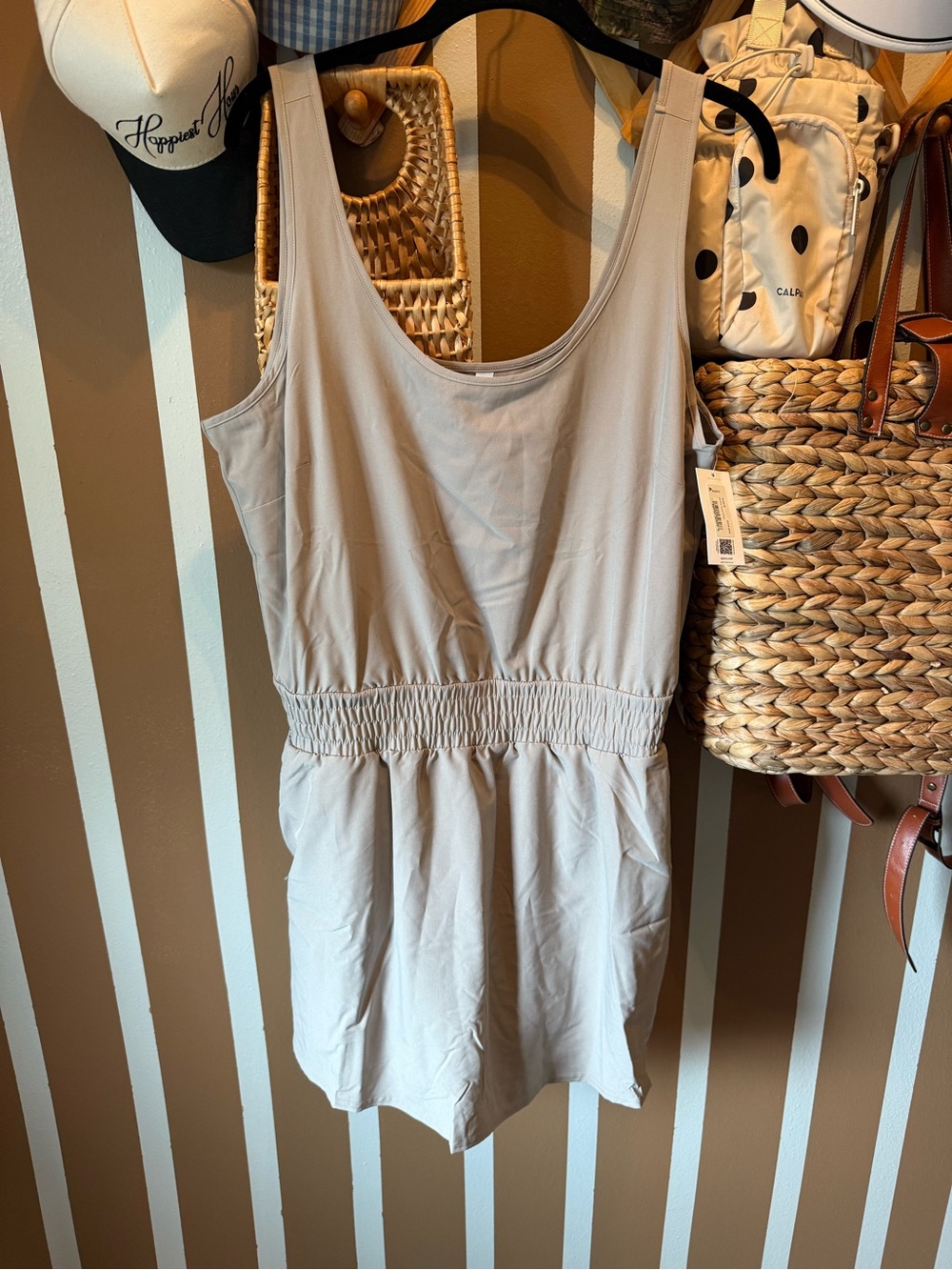 SPANX one piece. Zipper pockets and boy shorts underneath